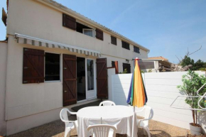 Maison T2 cabine 4 couchages, terrasse cloturée, résidence Sun village avec piscine commune, 300m de la plage à PORTIRAGNES PLAGE LRSUNR6